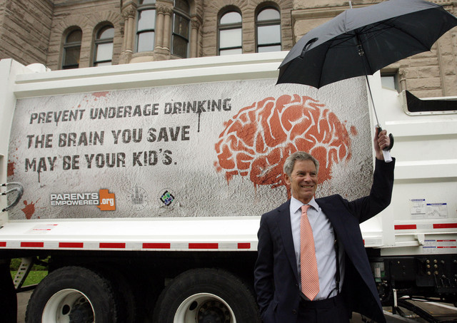 S.L. garbage trucks warn of underage drinking dangers