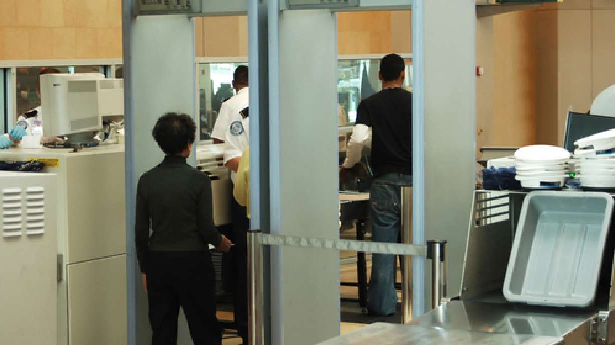 Poll shows that travelers approve of heightened airport security; frown on communication observation