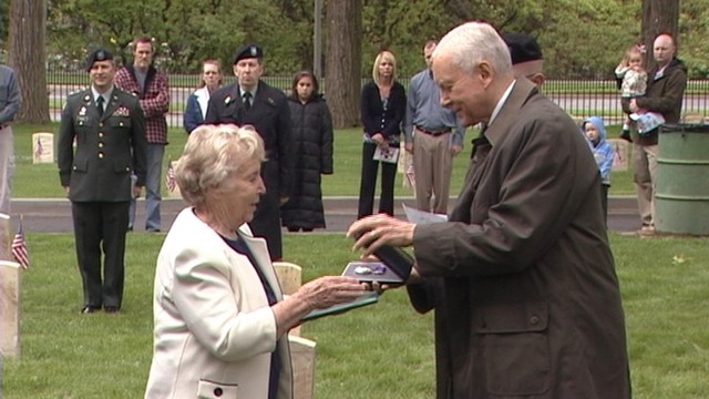 Lois Batty accepted a Purple Heart for her father, Sgt. Fernleigh Gardiner, who sustained lung damage as a result of mustard gas and shrapnel wounds from German machine guns in 1918.