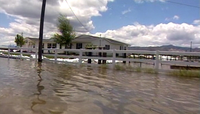 The Sevier River is now above flood stage, and water is filling farmland and even houses.