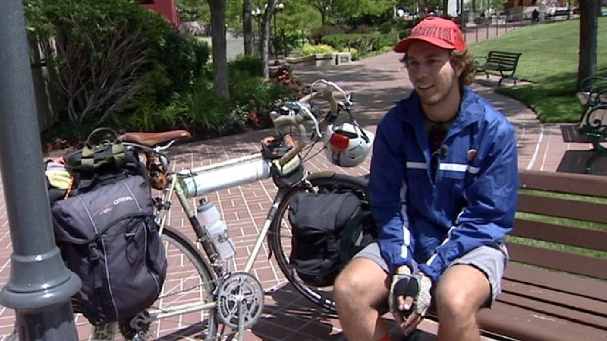 Artist cycling across America stops in Utah