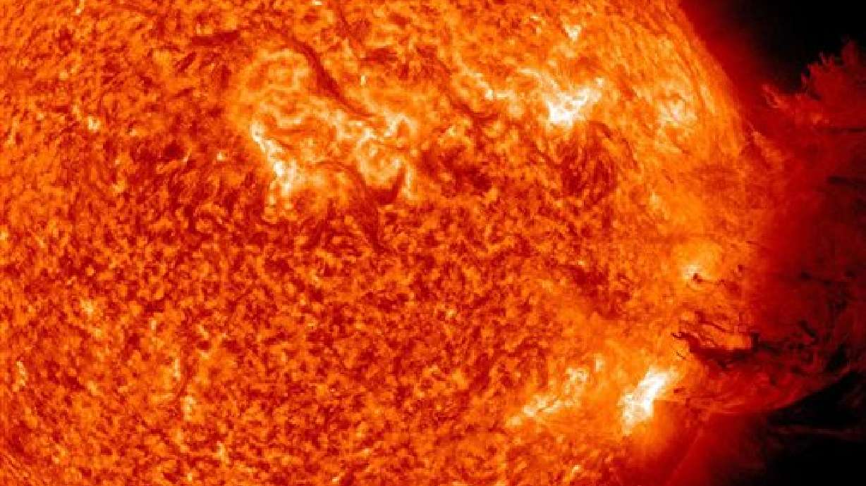 A solar flare erupts in this undated photo. Employees at the Space Dynamics Lab at Utah State University is using a new camera to investigate the impact on satellites from solar flares.