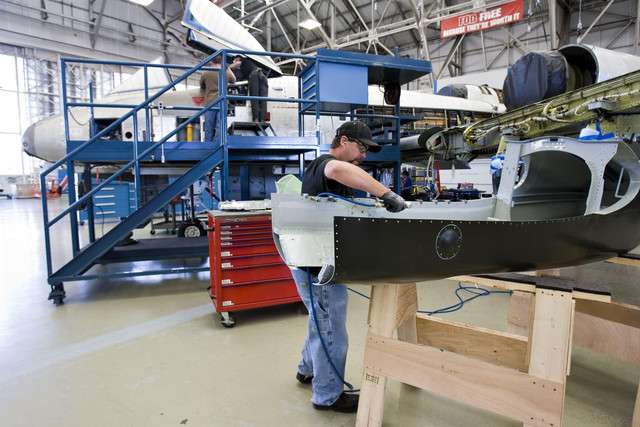 Civilian sheet metal mechanic Bronson Shaw works on parts for the Fairchild Republic A-10 Thunderbolt aircraft at Hill Air Force Base. (Mike Terry/Deseret News)