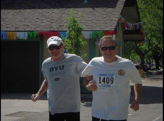 The brothers compete in the "Tri for Fun" triathlon. Because of his lack of vision Thom had to be escorted by his brother for most of the race.