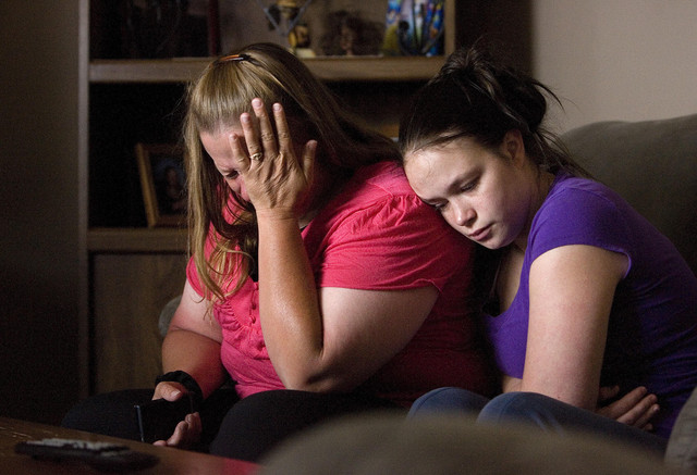 Patricia Suter and her daughter, Samantha, mourn the loss of their son and brother, Spc. Preston J. Suter, at Suter's West Valley City home on Thursday, July 7, 2011. Suter was killed on July 5 in Afghanistan. (Photo: Laura Seitz, Deseret News)