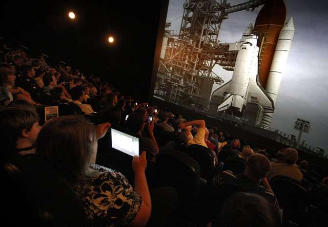 A couple hundred rocket enthusiasts gather Friday, July 8, 2011, to watch the final Space Shuttle launch in the Clark Planidarium IMAX theater in Salt Lake City. (Photo: Scott G. Winterton, Deseret News)