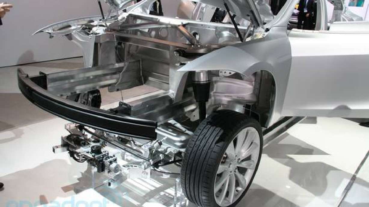 Tesla Model X SUV to launch in December, will be gliding quietly down the highway by 2014