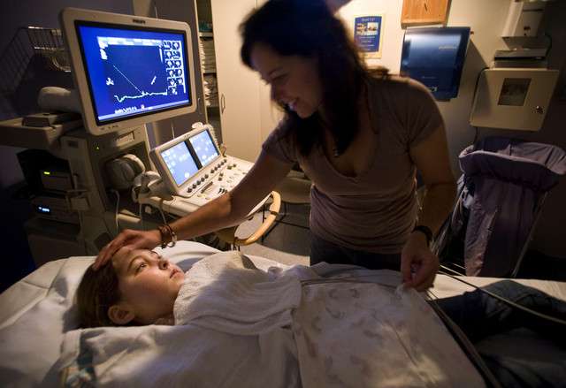 Heidi Brickey talks to her daughter MiaBella while at Primary Children's Medical Center.