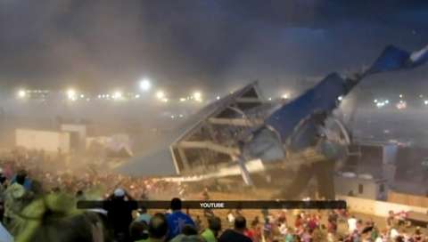 A wind gust estimated at 60 to 70 mph toppled the roof and the metal scaffolding holding lights and other equipment at the Indiana State Fair Saturday. The stage collapsed onto a crowd of concert-goers awaiting a show.