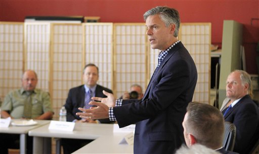 Huntsman pounds Perry on climate change and Fed