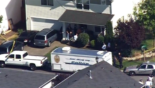 Police serve a search warrant at Steven and Josh Powell's house in Washington Thursday, Aug. 25, 2011. (Photo: KING-TV)