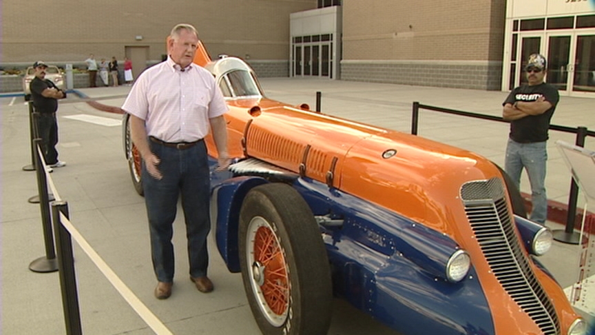 Ab Jenkins' grandson, Charlie Jenkins, photographed next to the Mormon Meteor III.