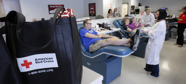 People donate blood at the Red Cross office in Salt Lake City Aug. 29, 2011. Giving blood could be an unconventional Mother's Day gift that gives the gift of life.