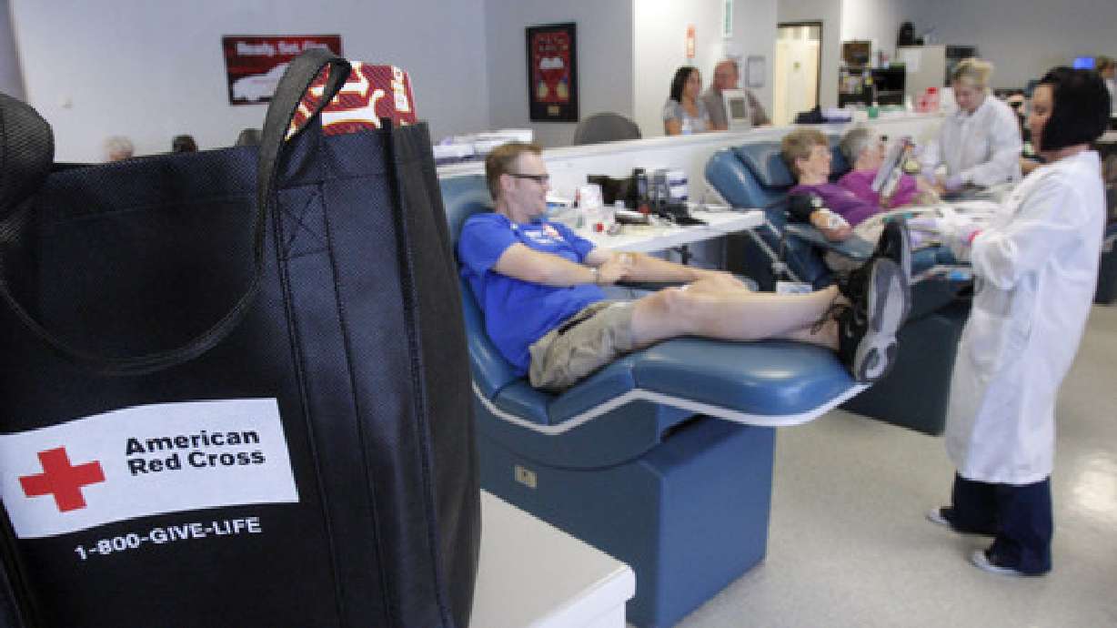 People donate blood at the Red Cross office in Salt Lake City Aug. 29, 2011. Giving blood could be an unconventional Mother's Day gift that gives the gift of life.