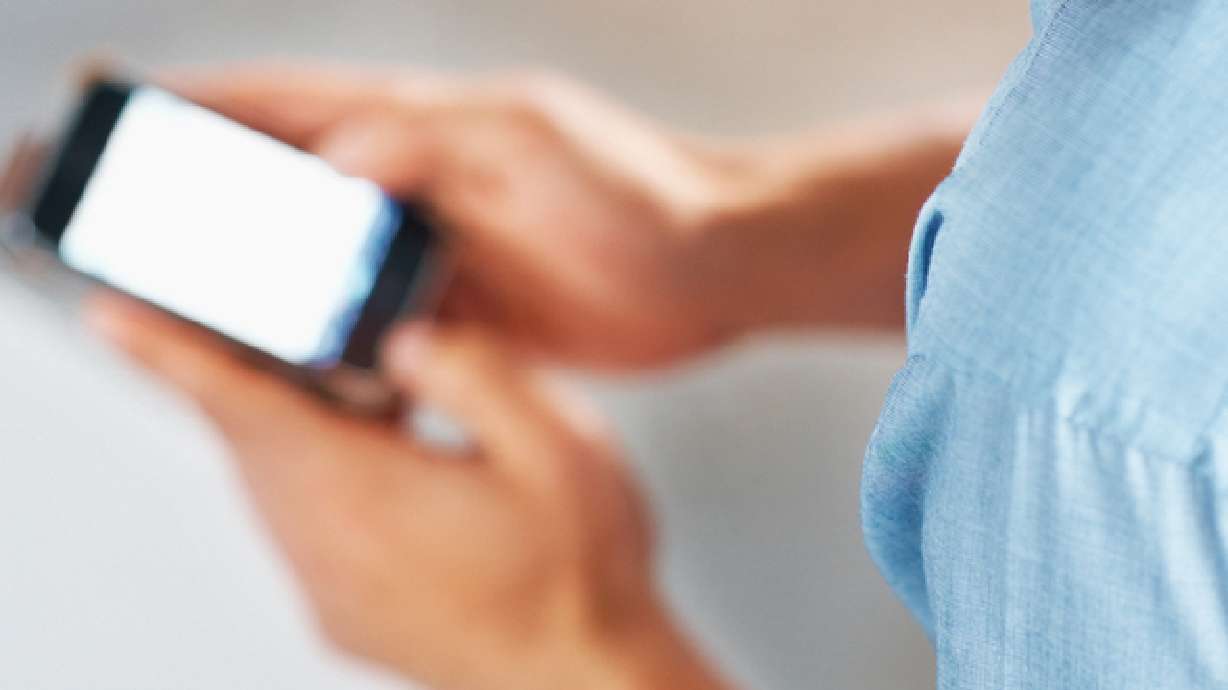 Are you a cellphone addict? The symptoms might surprise you