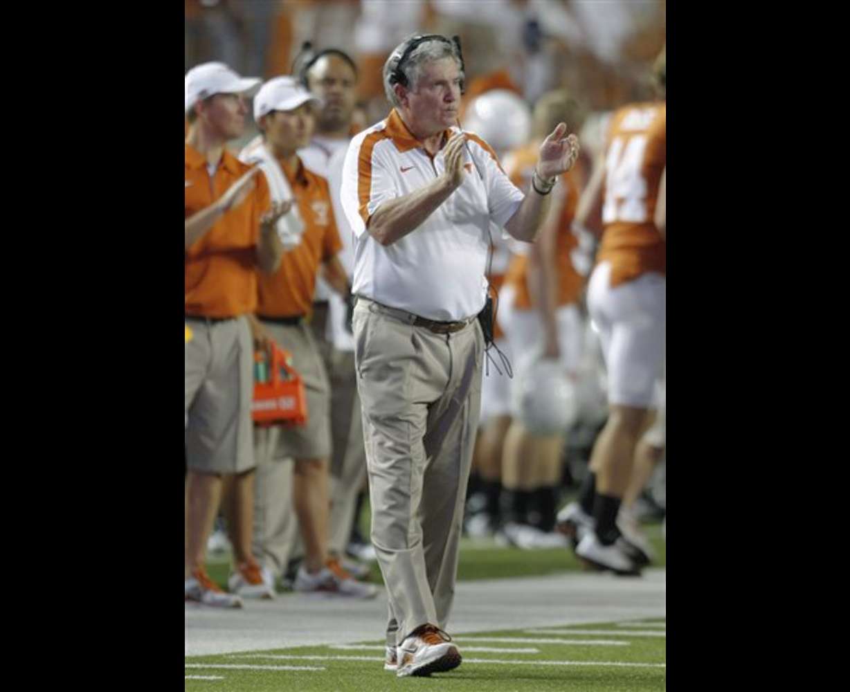 Texas coach Mack Brown walks the sideline during the Longhorns' game against Rice. (AP Photo/Eric Gay)