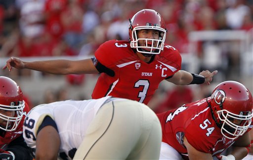 Jordan Wynn signals his team during the first half against the Montana State. (AP Photo/Jim Urquhart)