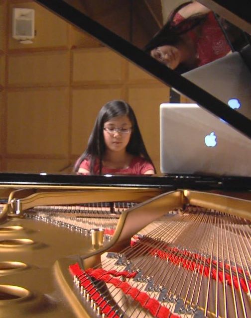 Shayna Oh practices for Friday night's performance at the Libby Gardner Music Hall at the University of Utah.