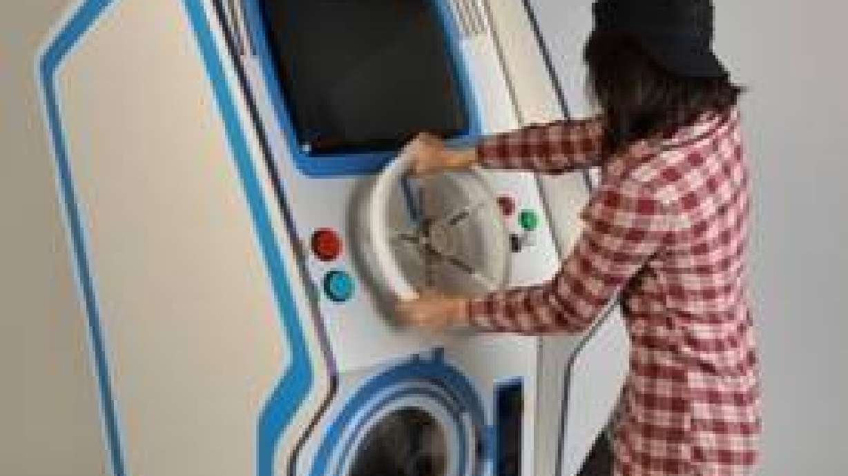 Washing machine/stand up video game