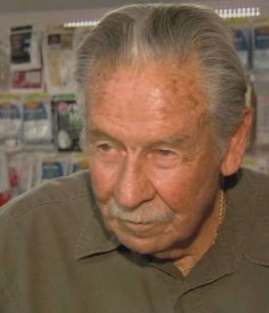 Dale Hedden, the longtime owner of a nearby vacuum store, said he was inside chatting with his son when a masked man dressed in black came in and announced he was robbing them.