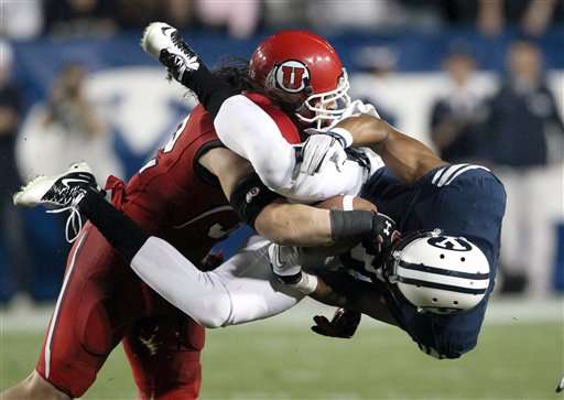 Utah LB Matt Martinez tackles BYU receiver Ross
Apo during the Utes 54-10 win in Provo (AP
Photo)