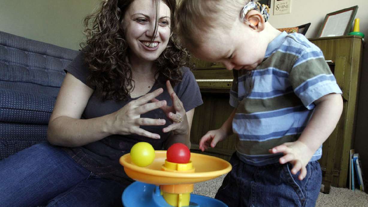 Parents of deaf children make education choices early