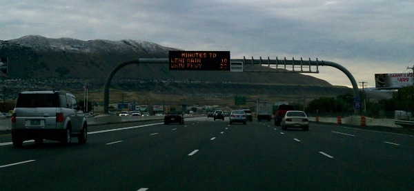 A variable message sign in Draper shows travel times and displays other information for commuters along I-15. (Photo: Andrew Johnson)