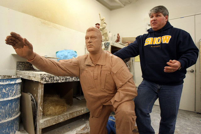 Sculptor Brad Taggart shows part of the Veteran's Memorial Sculpture during a tour of the Adonis Bronze foundry, to see how the Taylorsville's Veterans Memorial sculpture is casted that will be partially shown during the Taylorville Veteran's Parade and Program on November 4, 2011 Monday, Oct. 17, 2011, in Alpine, Utah. (Photo: Tom Smart, Deseret News)