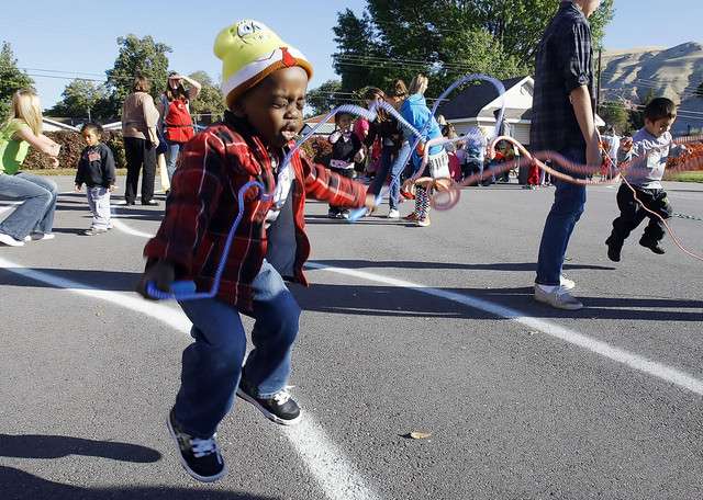 Romeo Kafi does his best to jump rope as
students from Crescent View Middle School in
Sandy provide service Tuesday, Oct. 18, 2011, to
the kids at the James R. Russell Center in Rose
Park. About 200 students from Crescent View
offered 400 Head Start preschoolers sports and
arts clinics as part of a day of service valued
at $21,000.