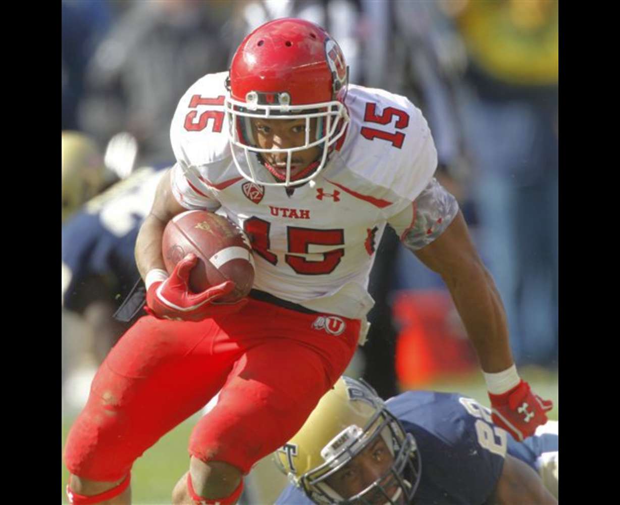 Utah running back John White IV runs against
Pitt. (AP Photo/Keith Srakocic)