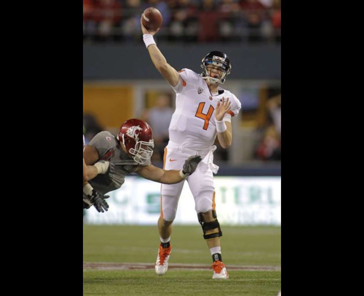 Oregon State quarterback Sean Mannion throws
against Washington State. (AP Photo/Ted S.
Warren)