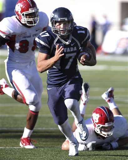 Nevada quarterback Cody Fajardo runs for a 
touchdown against Fresno State. (AP 
Photo/Cathleen Allison)