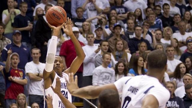 Damarcus Harrison shoots from the outside 
against Midwestern State. (Photo by Jonathan 
Hardy/BYU Photo)