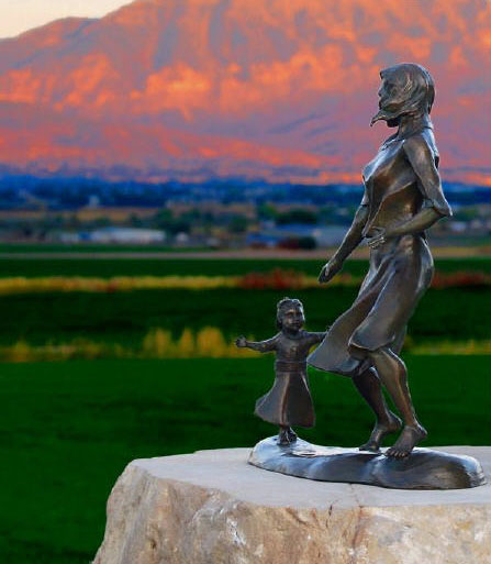 2 charged in theft of statue honoring deceased mother