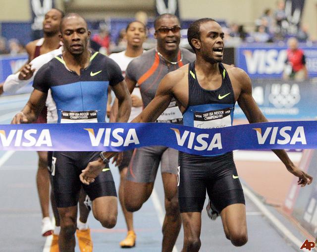 Jamaal Torrence, right, wins the men's 400 meters ahead of Kelly Willie, left, during the USA Indoor Track&amp;Field Championships, Sunday, March 1, 2009, in Boston. (AP Photo/Michael Dwyer)