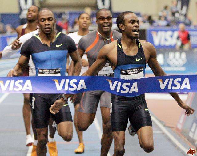Jamaal Torrence, right, wins the men's 400 meters ahead of Kelly Willie, left, during the USA Indoor Track&Field Championships, Sunday, March 1, 2009, in Boston. (AP Photo/Michael Dwyer)