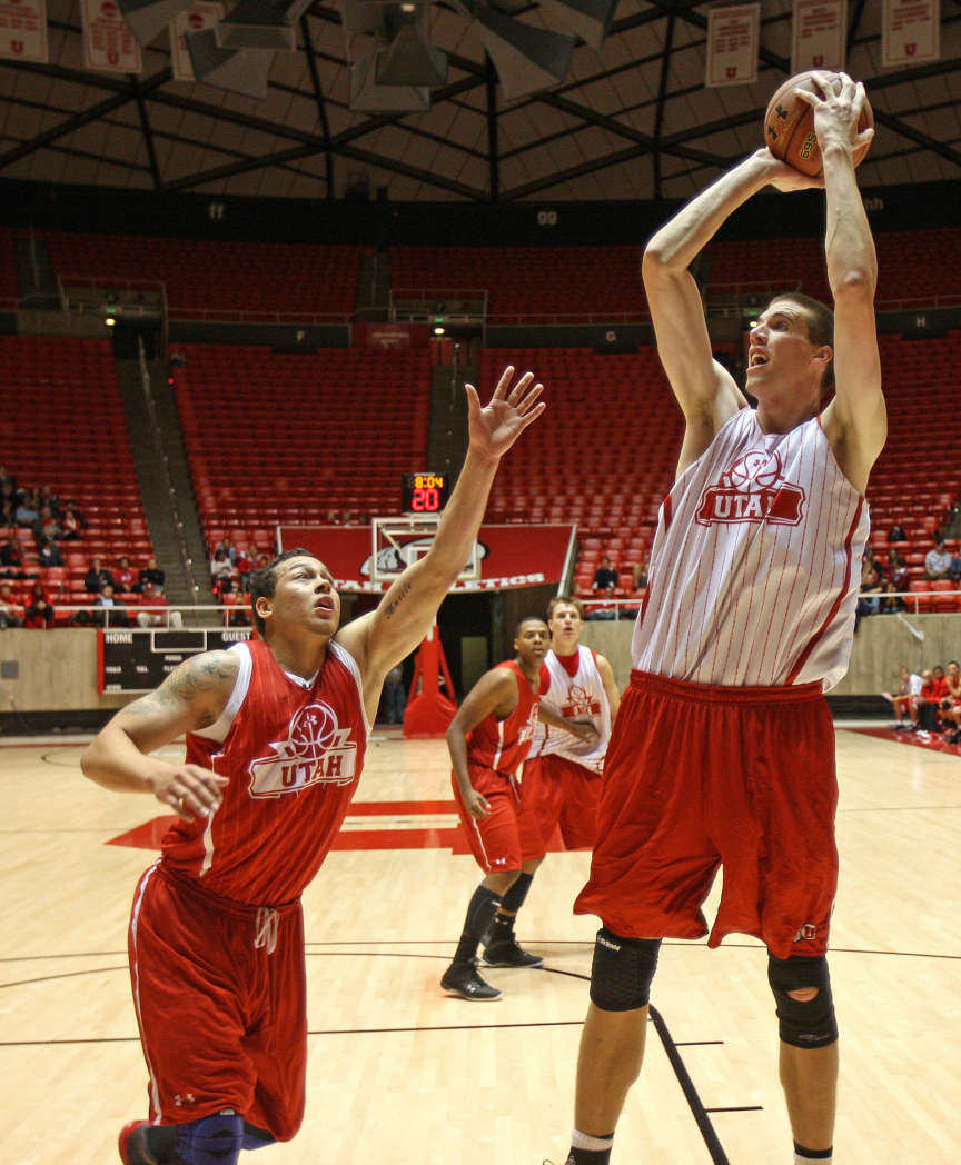 David Foster shoots over Javon Dawson at the University of Utah Red and White basketball scrimmage with new Utah coach Larry Kyststkowiak Wednesday, Oct. 26, 2011, in Salt Lake City, Utah. (Tom Smart, Deseret News)