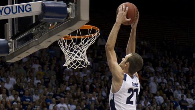 Stephen Rogers dnks against Dixie State. (Mark 
Philbrick/BYU Photo)