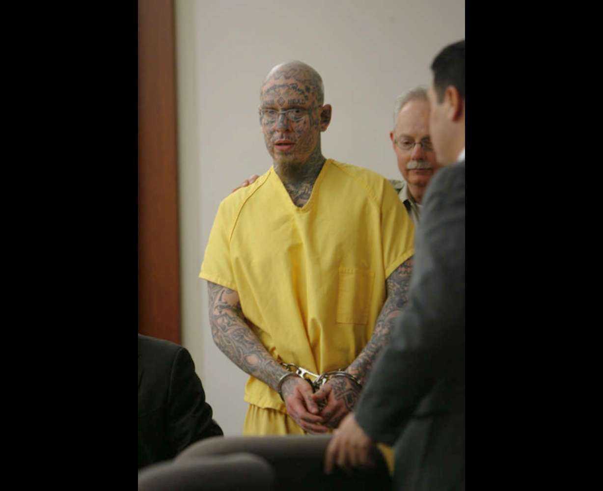 Prison inmate Curtis Allgier, charged with capital murder and seven other felonies for the June, 25, 2007, slaying of 60-year-old prison officer Stephen Anderson, who was killed with his own gun while taking Allgier to the University Hospital for an MRI, appears before Judge Robin Reese at the Matheson Courthouse.