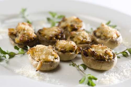 These stuffed mushrooms make a great appetizer and also work well
as an accompaniment to meat dishes.