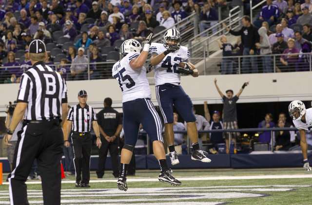 BYU RB Michael Alisa celebrates a touchdown
against TCU with OL Terrance Brown. (Mark
Philbrick/BYU Photo)