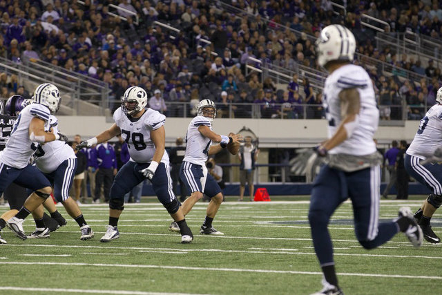 BYU QB Riley Nelson looks to pass to WR Cody
Hoffman against TCU. (Mark Philbrick/BYU Photo)