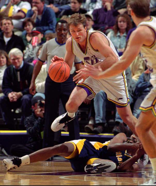 Tom Chambers steals the ball and heads up court for fast break (Jeffery Allred, Deseret News)