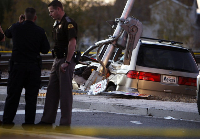 Officials investigate at the scene of a FrontRunner accident with an automobile at about 600 Old Mill Lane in Kaysville, Monday, Nov. 14, 2011. (Photo: Ravell Call, Deseret News)