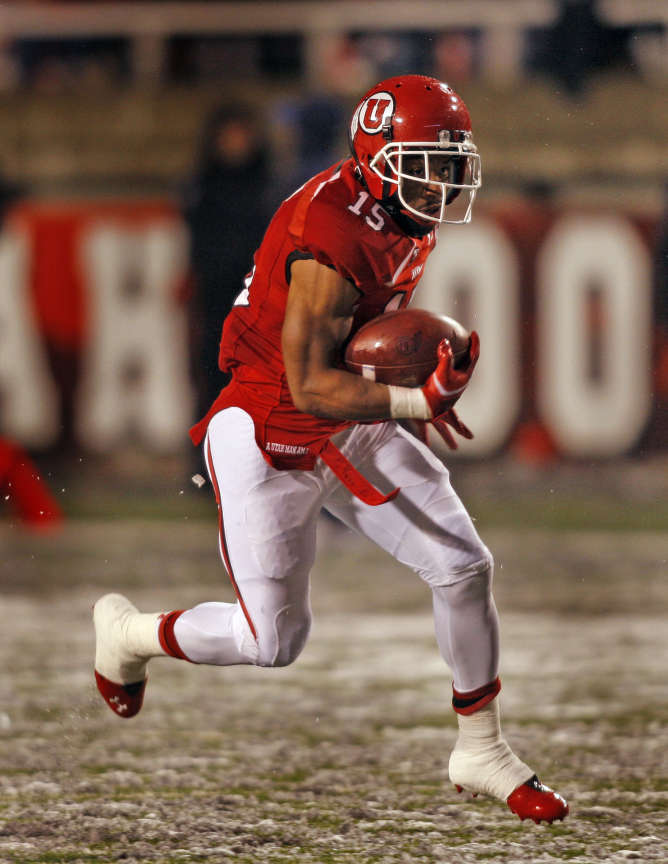 Utah Utes running back John White IV (15) runs for yardage as the University of Utah plays UCLA in PAC 12 football Saturday, Nov. 12, 2011 in Salt Lake City, Utah. (Tom Smart, Deseret News)