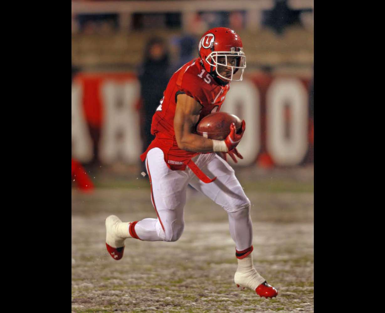 Utah Utes running back John White IV (15) runs for yardage as the University of Utah plays UCLA in PAC 12 football Saturday, Nov. 12, 2011 in Salt Lake City, Utah. (Tom Smart, Deseret News)