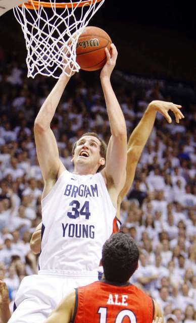 BYU's Noah Hartsock puts the ball up for a
basket against BYU-Hawaii. (Deseret News)