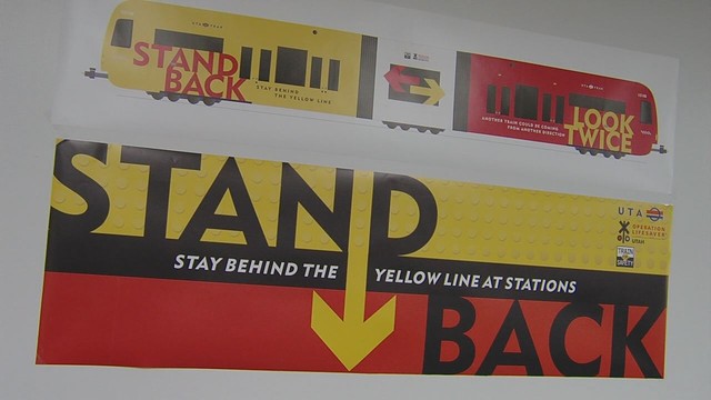 The new UTA safety campaign encourages people to keep their "heads up — don't text around trains," "listen up — remove headphones around trains," "stand back — stay behind the yellow line at stations," and "look twice — another train could be coming from the other direction."