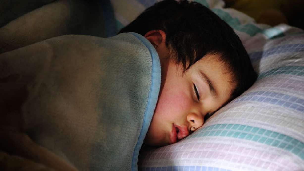 10 ways to get your kids to sleep in their own bed