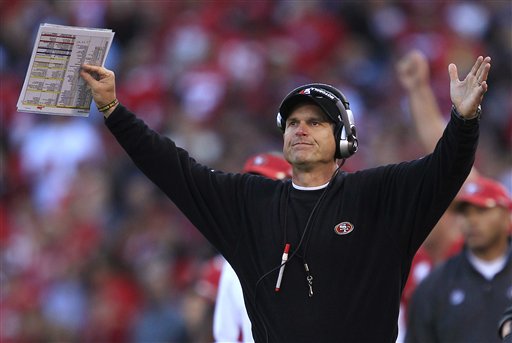 San Francisco 49ers coach Jim Harbaugh gestures 
in the fourth quarter against the New York 
Giants. (AP Photo/Marcio Jose Sanchez)